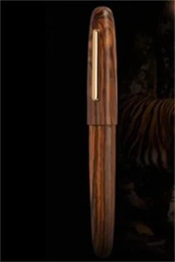 Wooden fountain pen with rotating cap in various wood finishes with interchangeable nib options