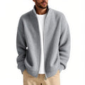 Man wearing a loose grey men's cardigan sweater coat for casual leisure wear