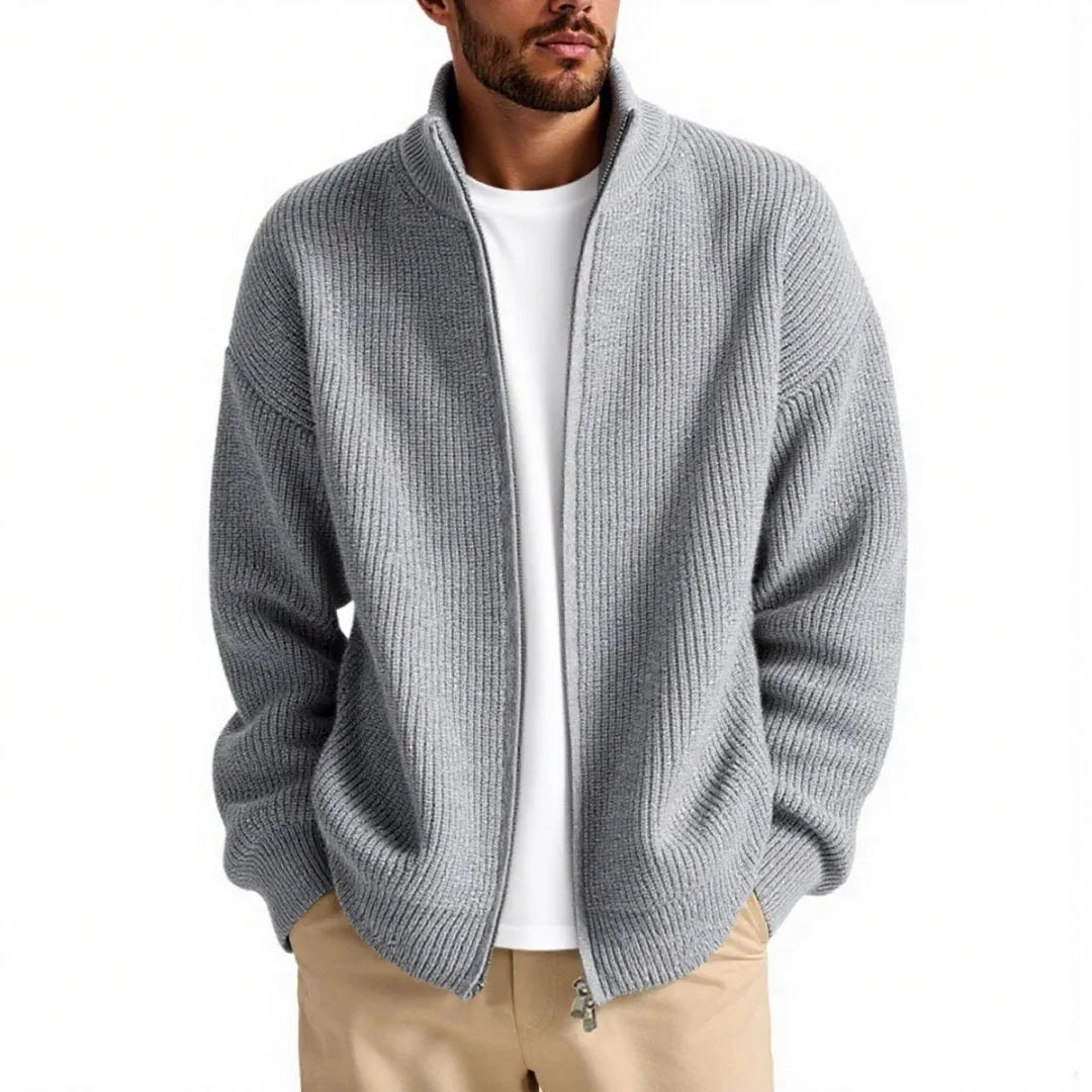 Man wearing a loose grey men's cardigan sweater coat for casual leisure wear