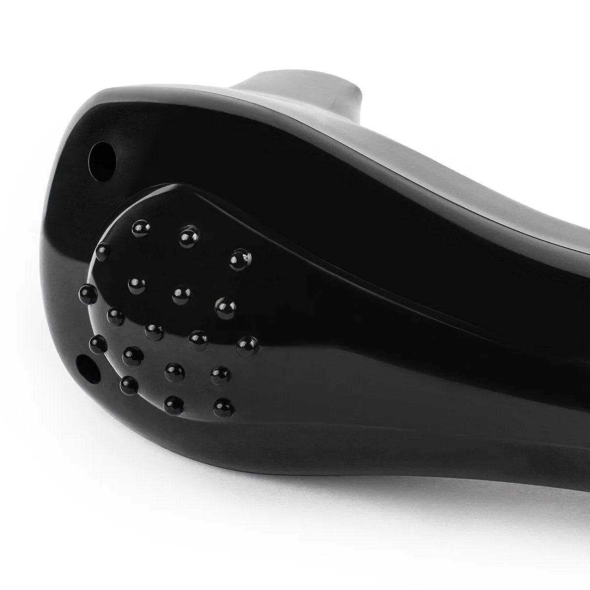 Black folding body electric shaver in open and closed positions showing battery compartment