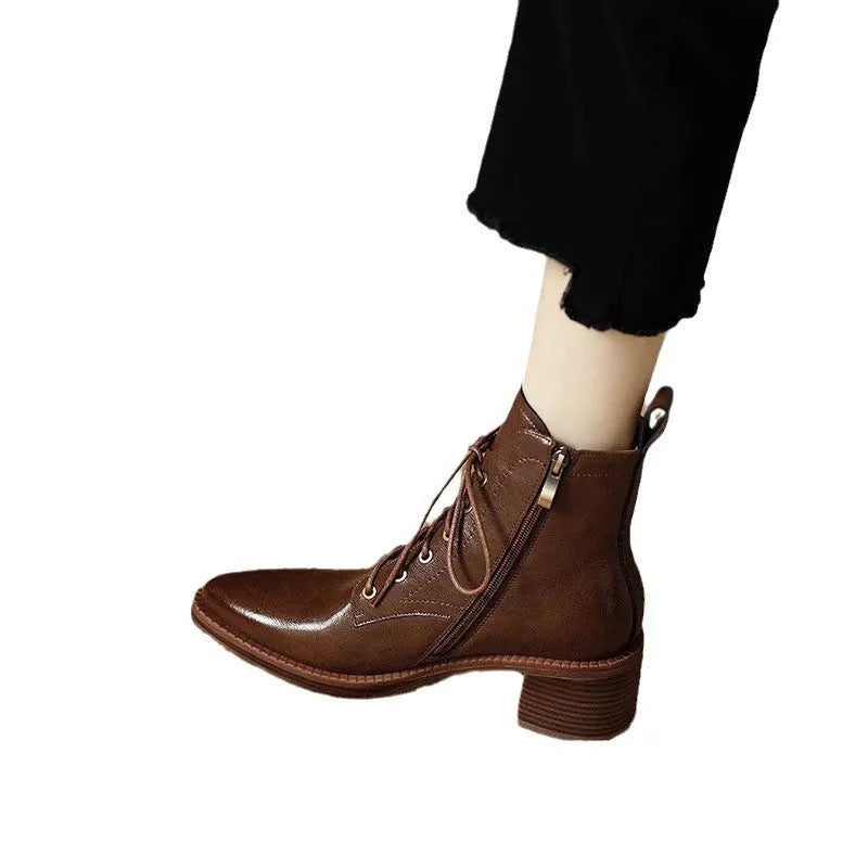 Women's black pointed-toe short tube boots with 13cm sock length and artificial PU upper
