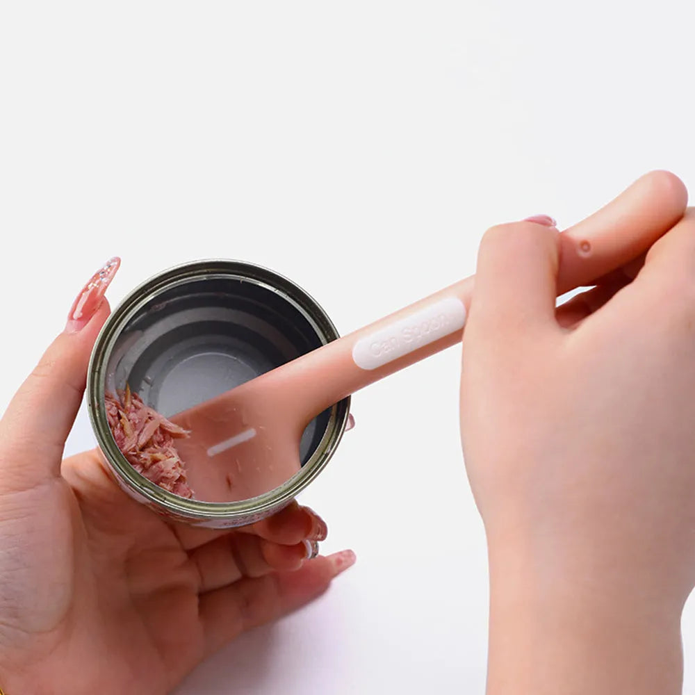 Long-handled pet feeding spoon in green colour with right-angle design for canned food