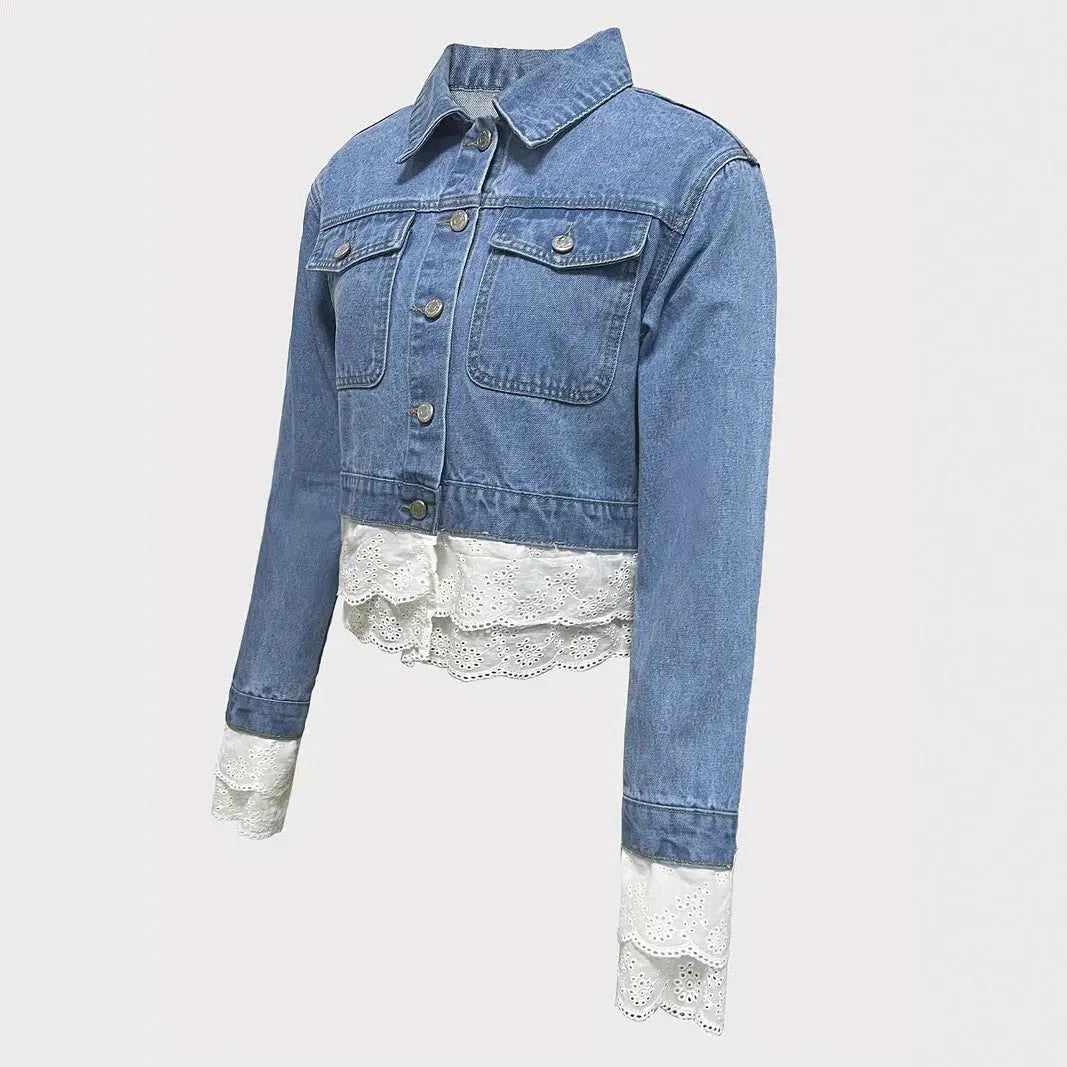 Blue women's denim jacket with lace stitching detail on the sleeves and front, featuring long sleeves.