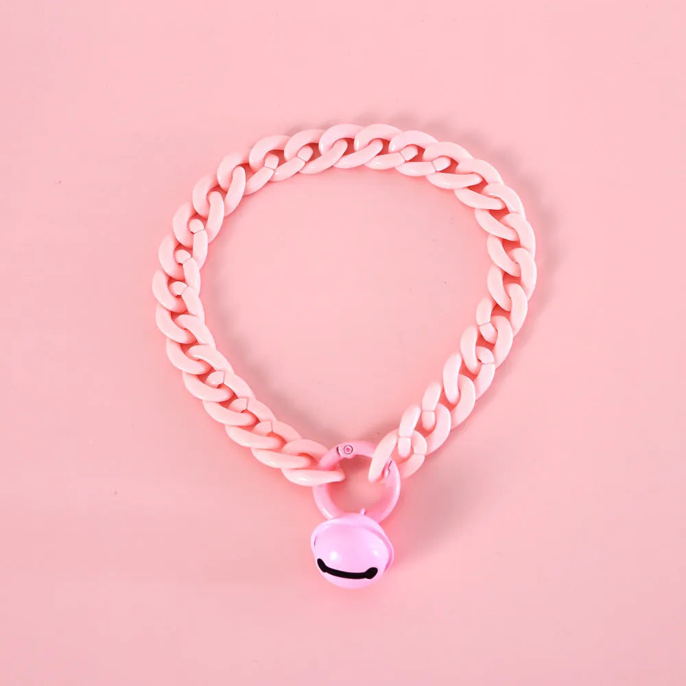 Plastic monochrome chain pet collar shown in chain blue, pink, and mixed colours for S and M sizes.