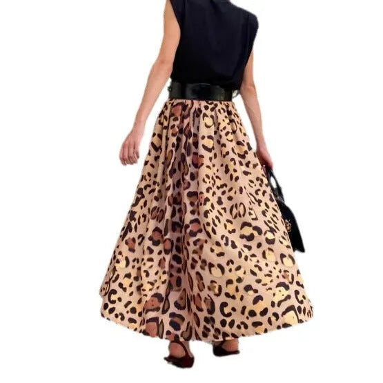 Brown leopard print women's A-line long skirt with a big hem on a hanger.