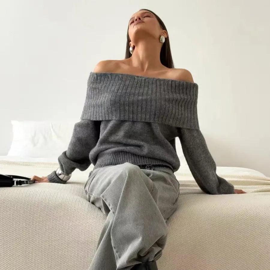 Grey off-the-shoulder sweater with a 3D pattern texture, showing strapless neckline design.