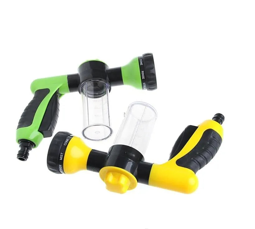 Green high pressure foam spray gun with adjustable nozzle for car washing and household cleaning.