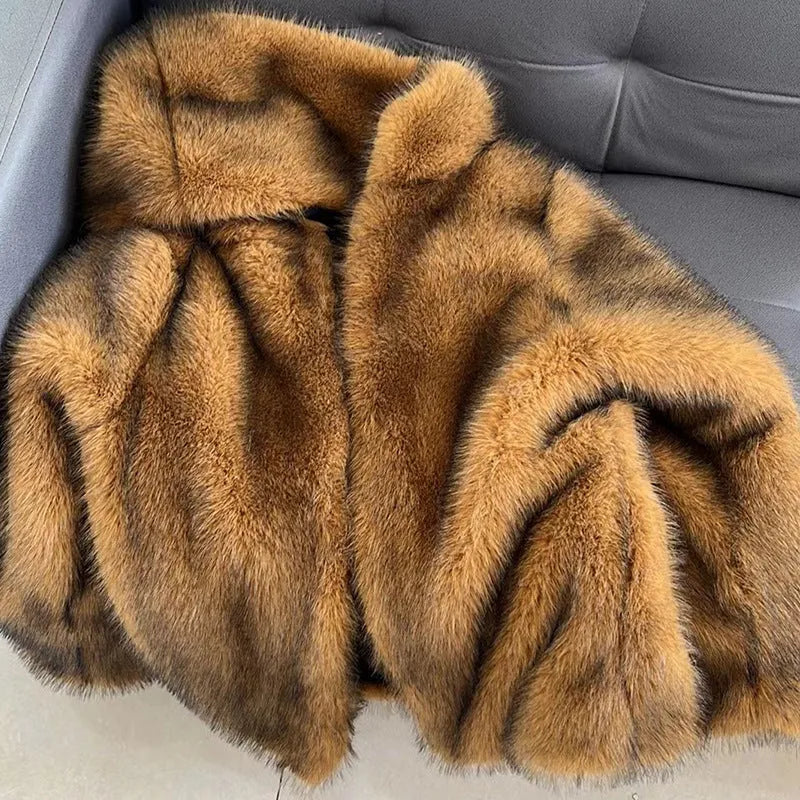 Women's silver grey artificial fur coat with a loose fit and mid-length 65cm silhouette.