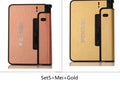 Two automatic cigarette cases, one black and one gold, with metal brushed veneer finish, held open showing cigarette chamber and lighter slot.