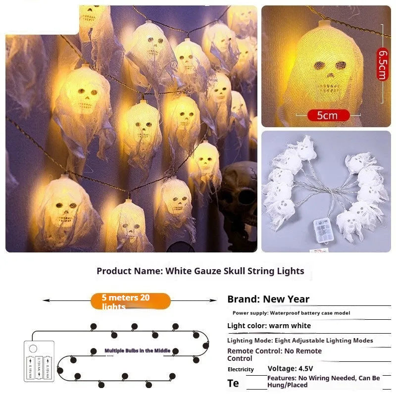 Halloween coloured LED string lights with battery box in 1.5m or 2.5m lengths on an indoor wall.