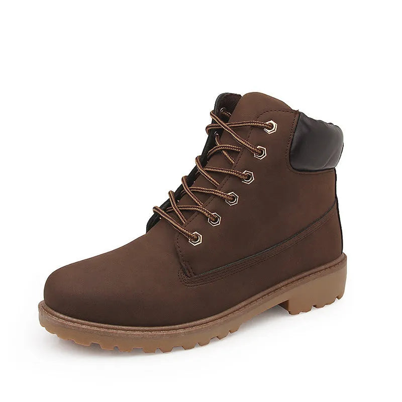 Men's pink Martin ankle boots with velvet lining, round toe, flat sole, and front lace-up closure.