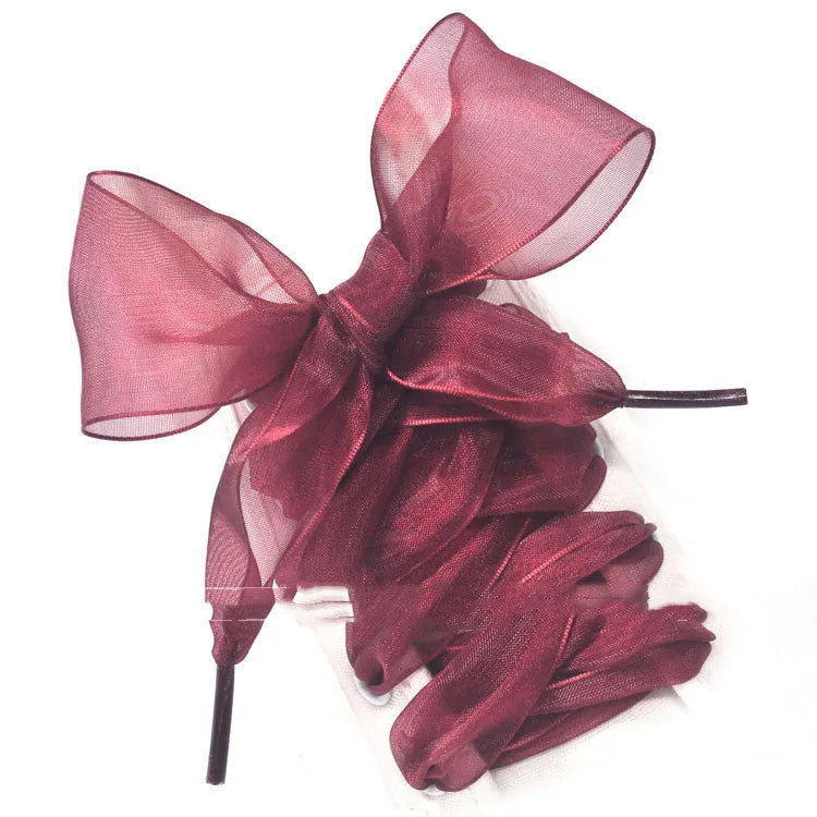 Wide 4cm transparent silk shoelaces in beige, black, and wine red colours, showing length.