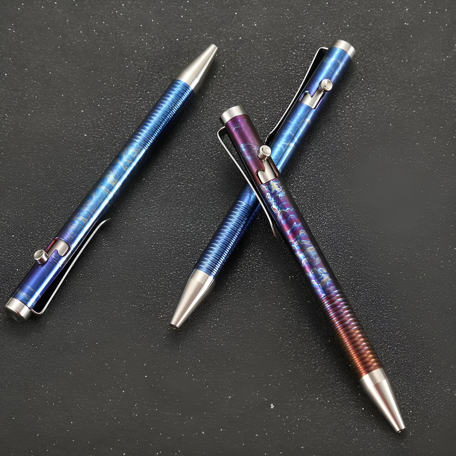 Titanium alloy bolt-action ballpoint pen with gun-bolt handle in phantom colour.