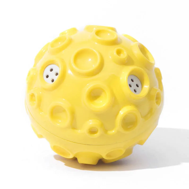 Durable natural rubber dog ball toy with textured surface and squeaker for aggressive chewers.