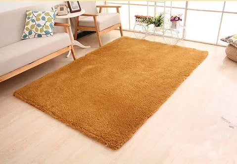 Rectangular solid colour carpet with velvet surface showing non-slip dot patterned bottom layer