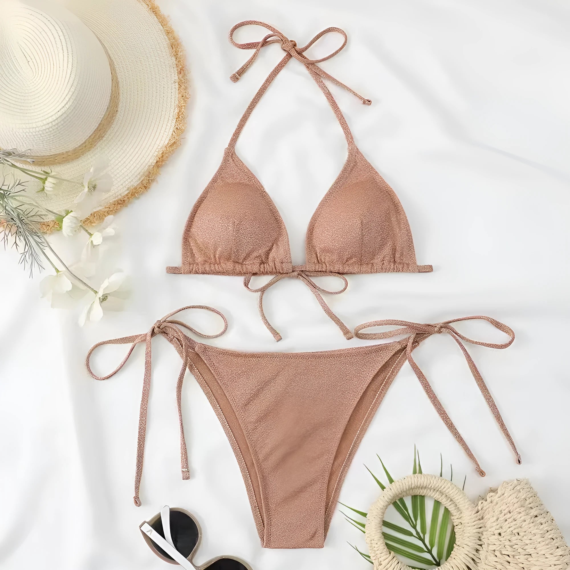 Women's black bandage bikini swimsuit with split detail briefs and matching top.