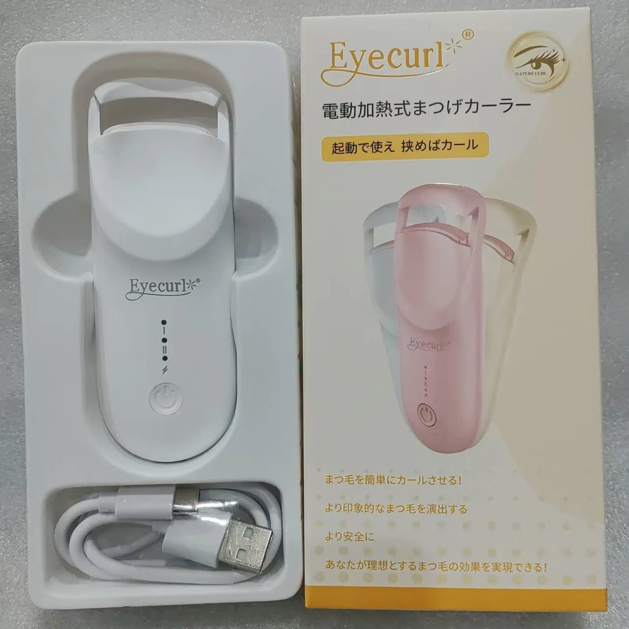 Plastic electric heating eyelash curler with USB cable in cream white colour