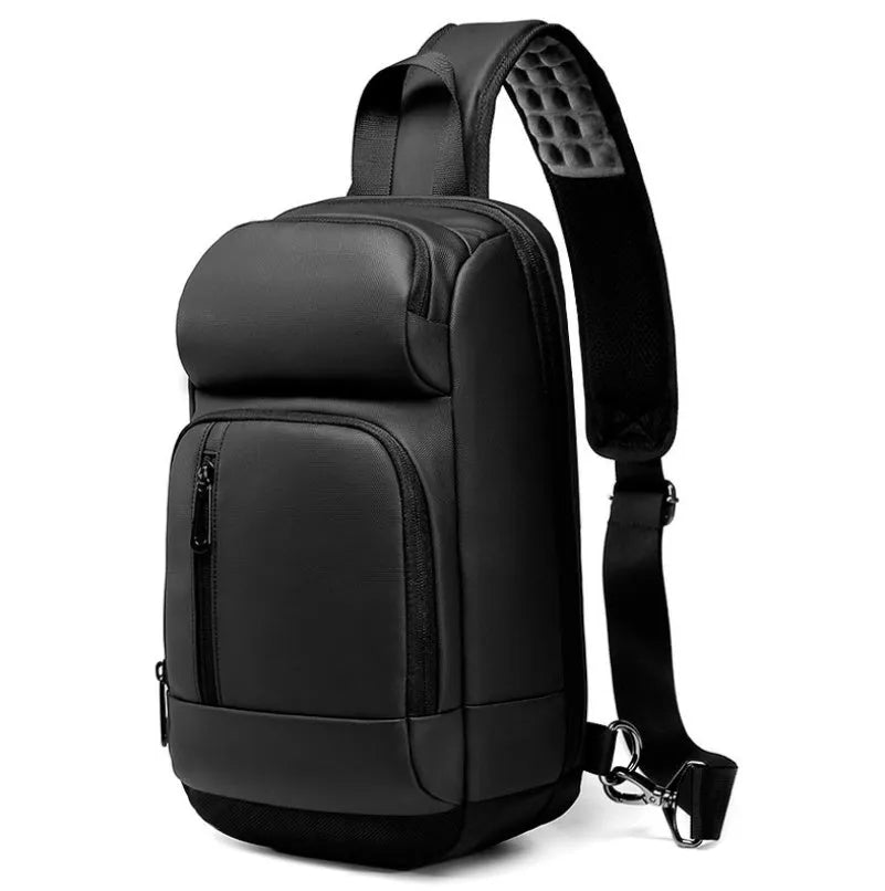Black PVC outdoor shoulder bag showing internal organisation compartments and air cushion strap