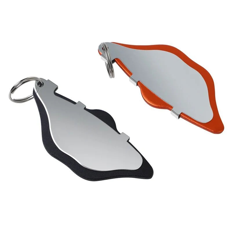 Mountain bike disc brake pads set showing metal linings and adjustment flap in black and orange colour options