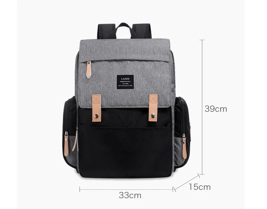 LAND Mommy Diaper Bag Backpack in oxford cloth with changing mat, shown in beige colour.