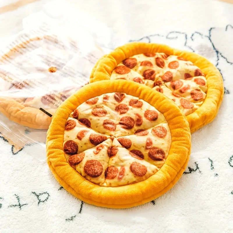 Yellow pizza slice shaped squeaky dog chewing toy with textured toppings and crust detailing
