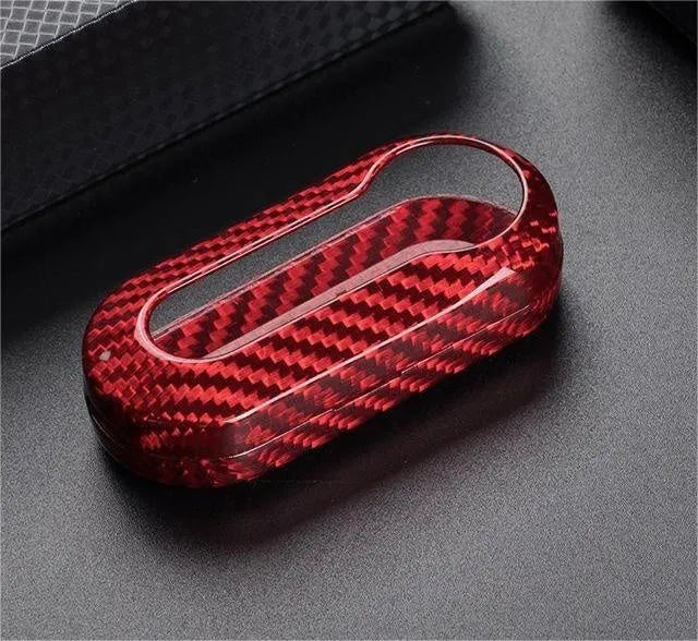 Carbon fibre and glass fibre replacement shell for a car remote key fob.