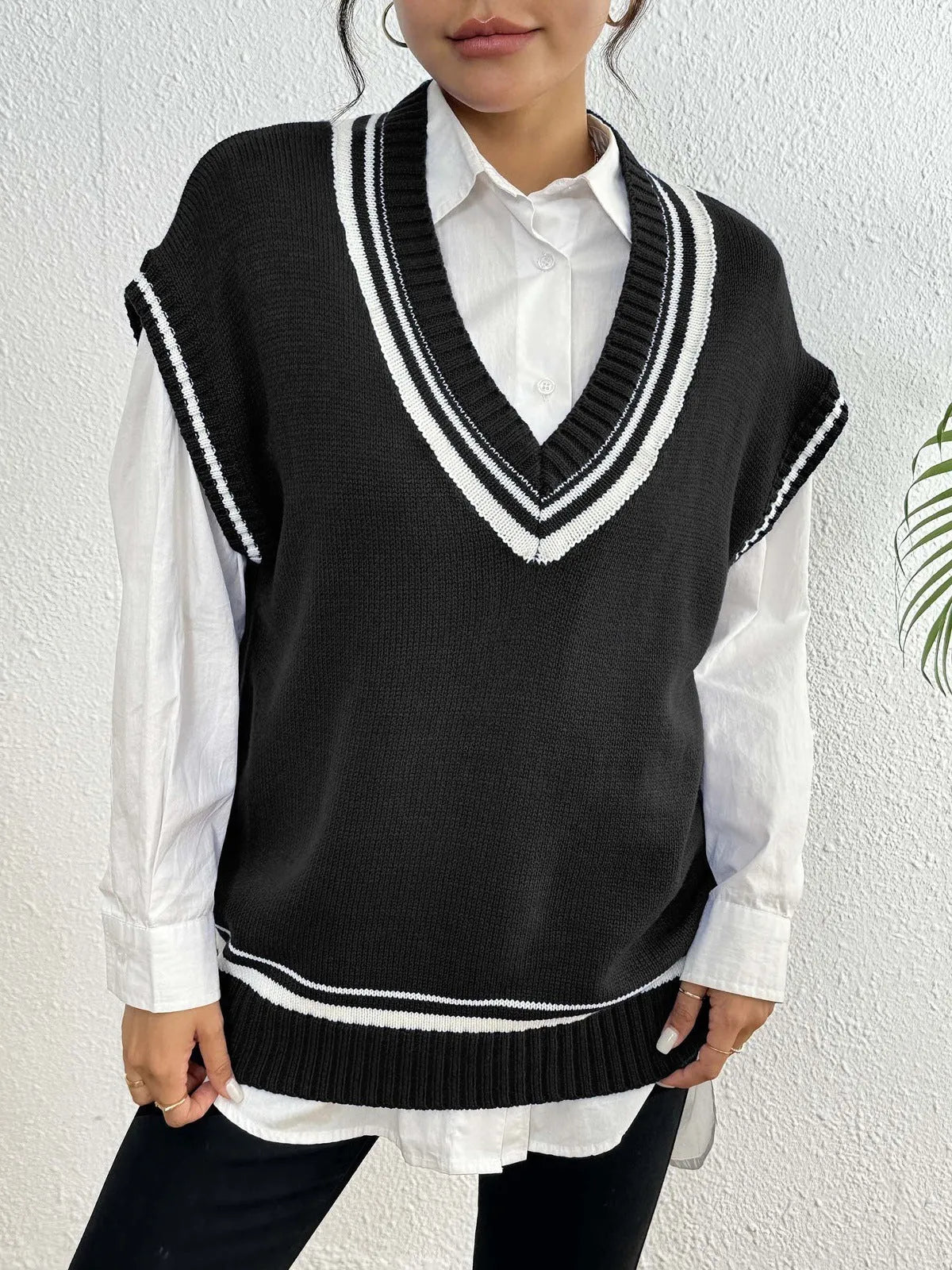 Women's loose fit college style vest sweater in blue, coffee, or black colour.