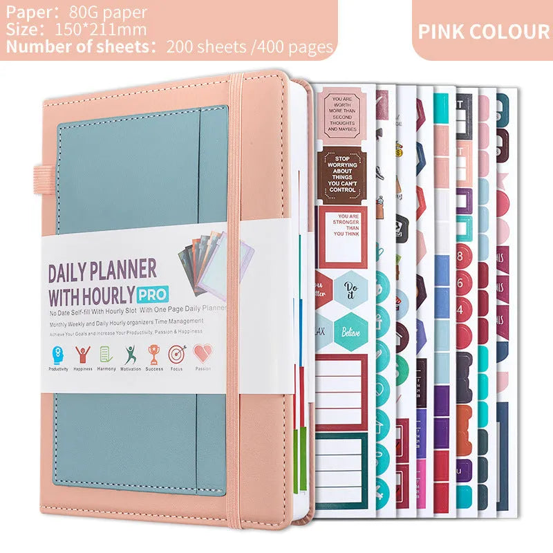 A5 notebook with purple PU cover closed by a black elastic strap