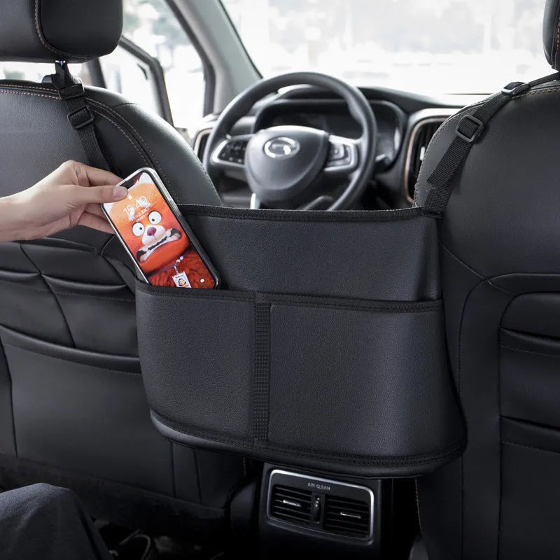 Black leather car seat storage net pocket with sports carbon fibre pattern.