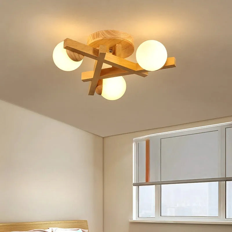 Wooden style modern ceiling light with three neutral light heads in Nordic design