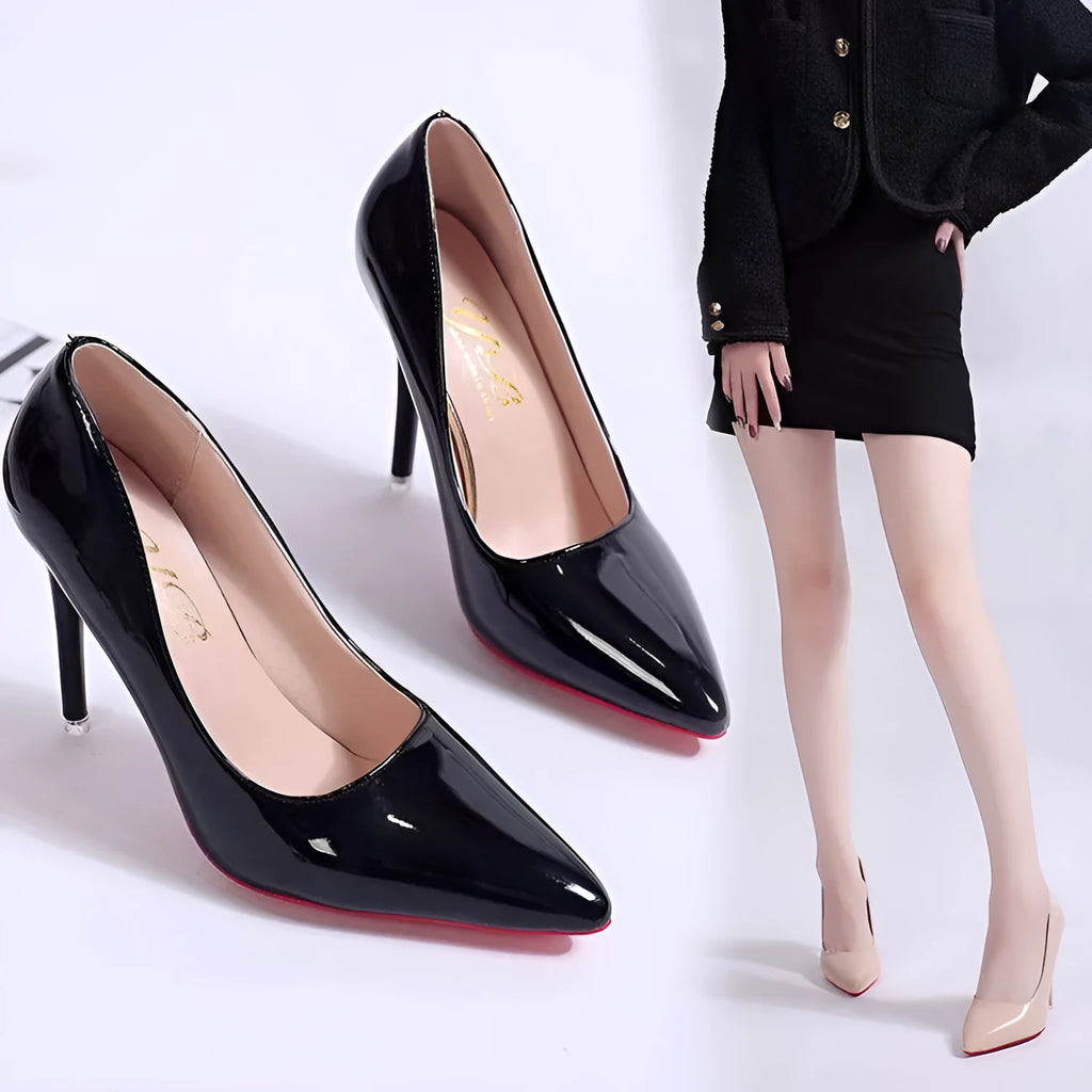 Women's solid colour stiletto heel pump with pointed toe and shallow mouth cut on a rubber sole.