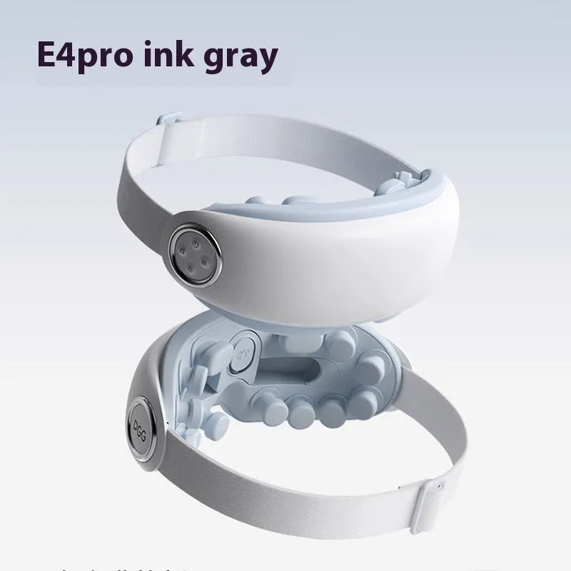 Rechargeable Bluetooth eye hot compress and massage mask in purplish grey, shown with data cable.