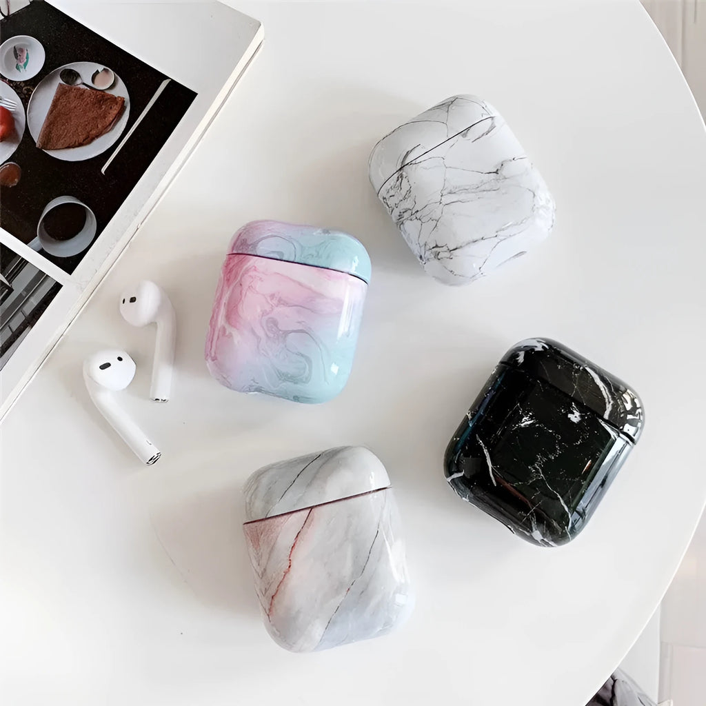 White Marble hard PC protective case fitted on an AirPods wireless charging case.