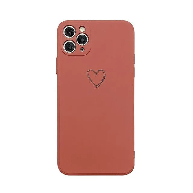 Silicone phone case for Apple iPhones in multiple solid colours including black, white, and pastel options
