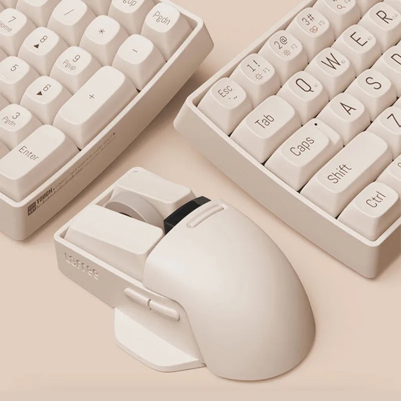 Xiaoqiao Tofu Colour wireless computer mouse with USB receiver on a desk.