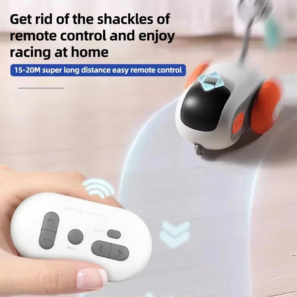 Smart electronic cat toy car with feather attachment and remote control on blue background