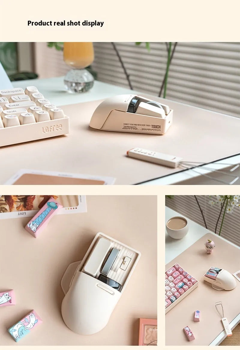 Xiaoqiao Tofu Colour wireless computer mouse with USB receiver on a desk.