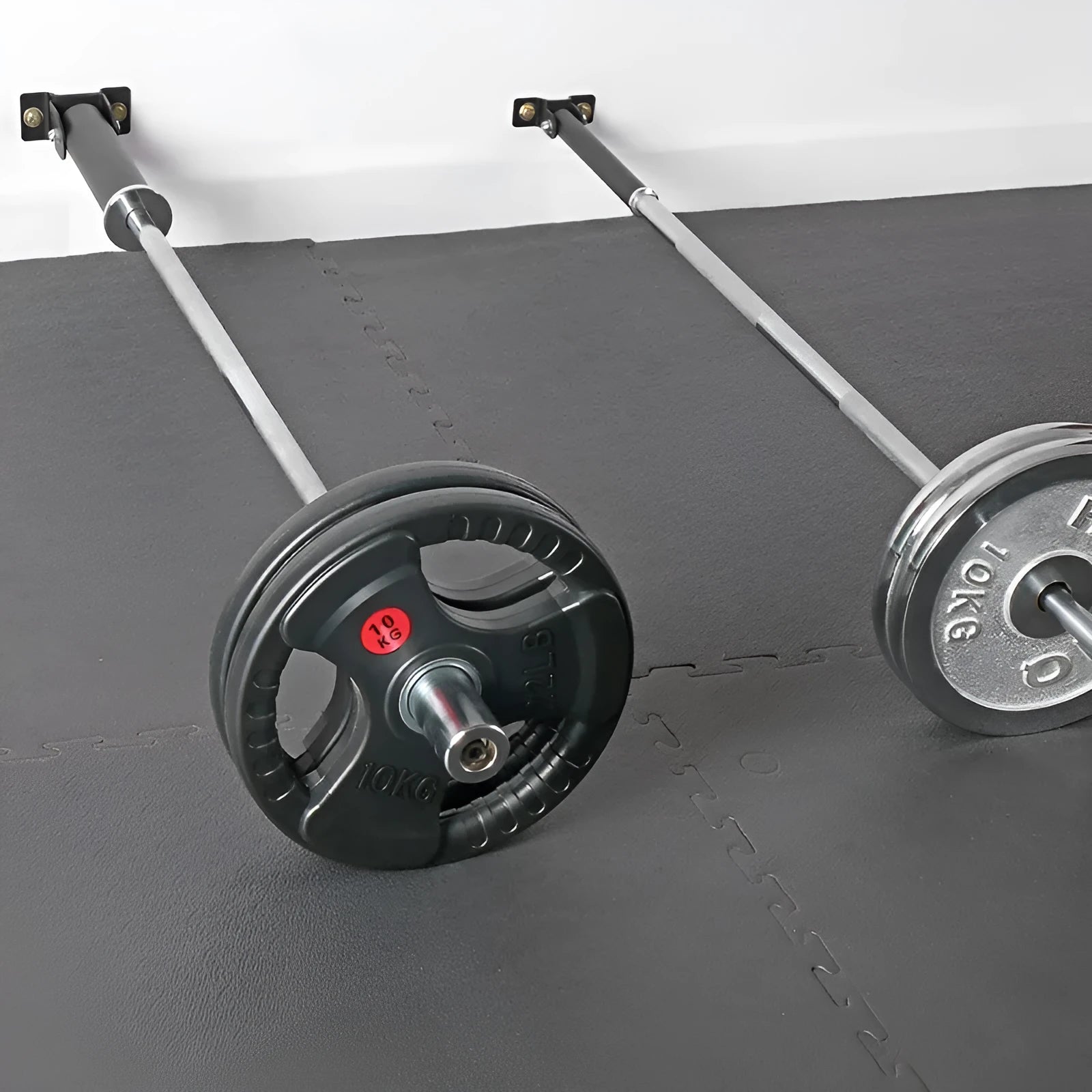 Steel wall-mounted rack holding multiple barbell bars or tubes