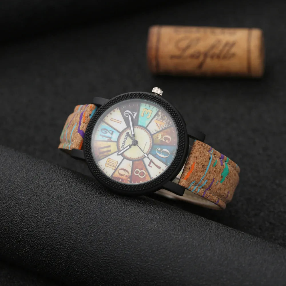 Women's vintage-style quartz watch with brown leather strap and 37mm round dial
