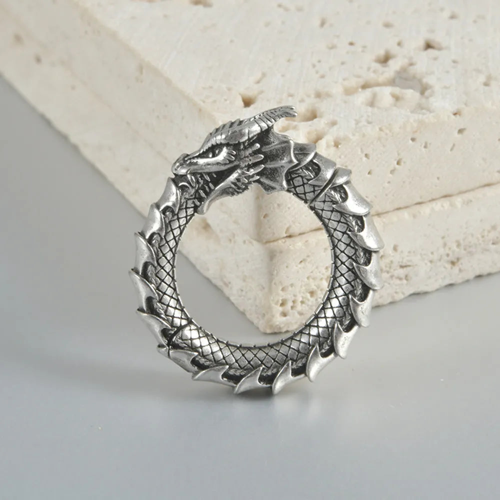 Stainless steel alloy earrings with antique silver dragon hollow-out geometry design