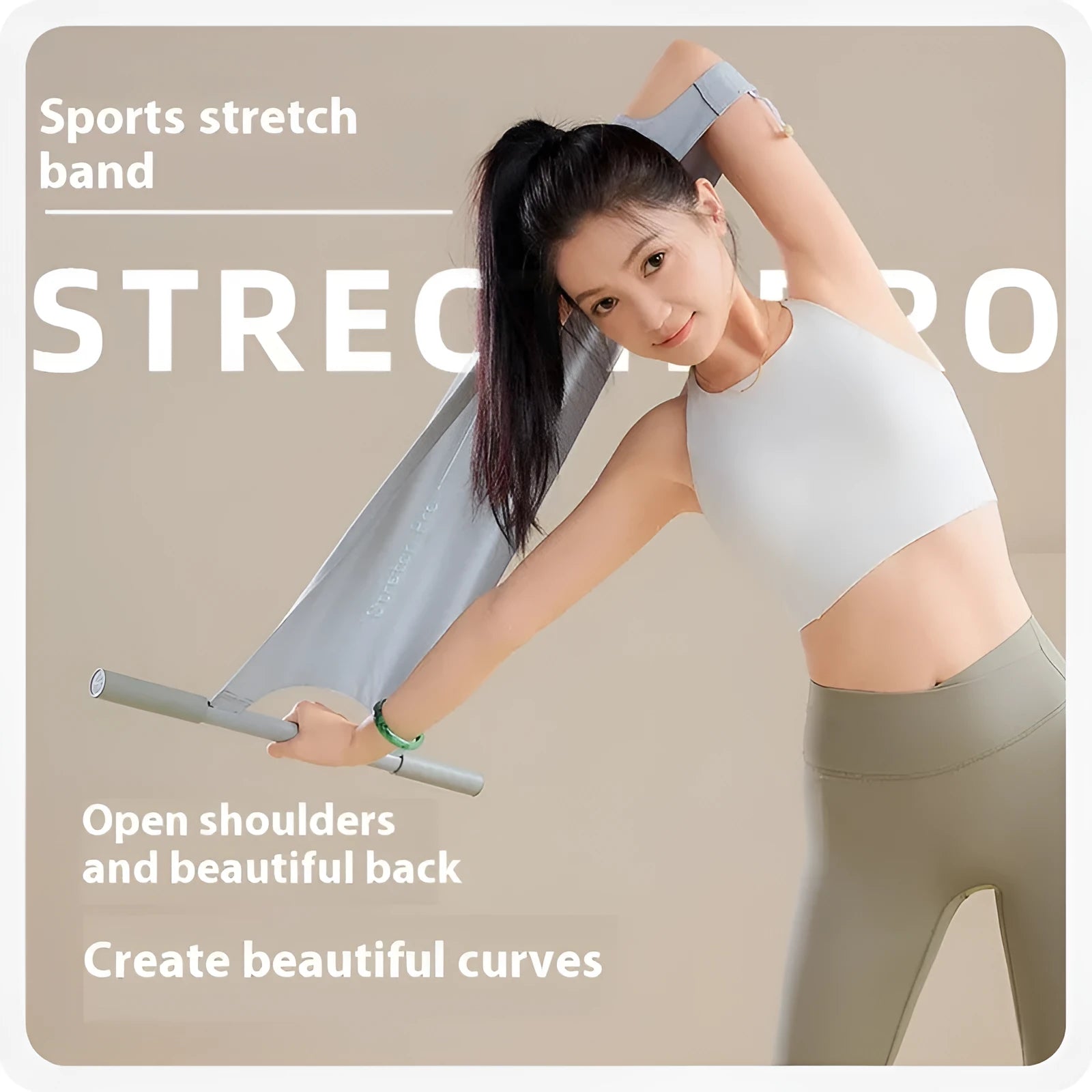 Grey and pink multi-function yoga stretching tool for shoulder, back and hip exercises.