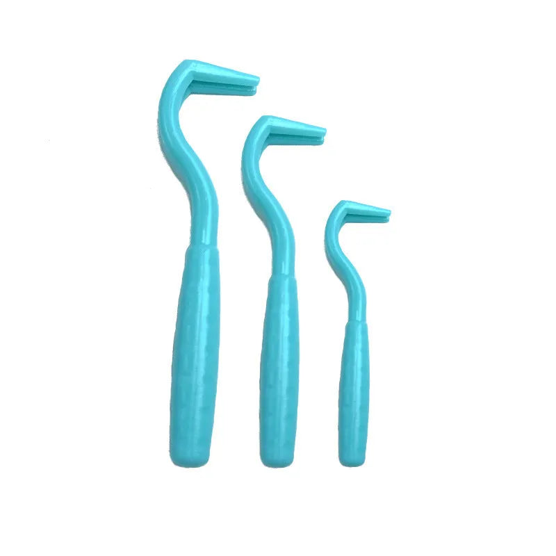 Set of three pet tick removal hooks in various colours for dogs