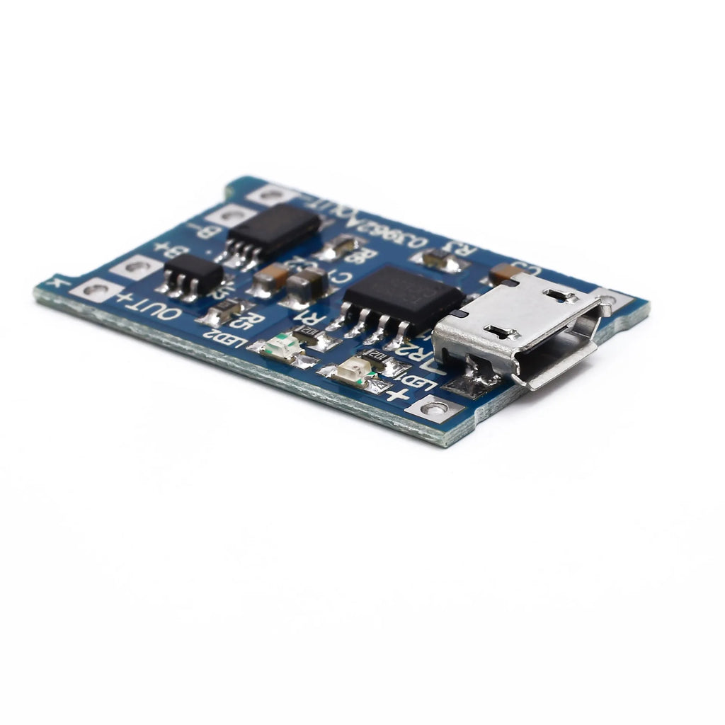 Blue lithium battery charging and protection integrated circuit board measuring 2.6 by 1.7 centimetres