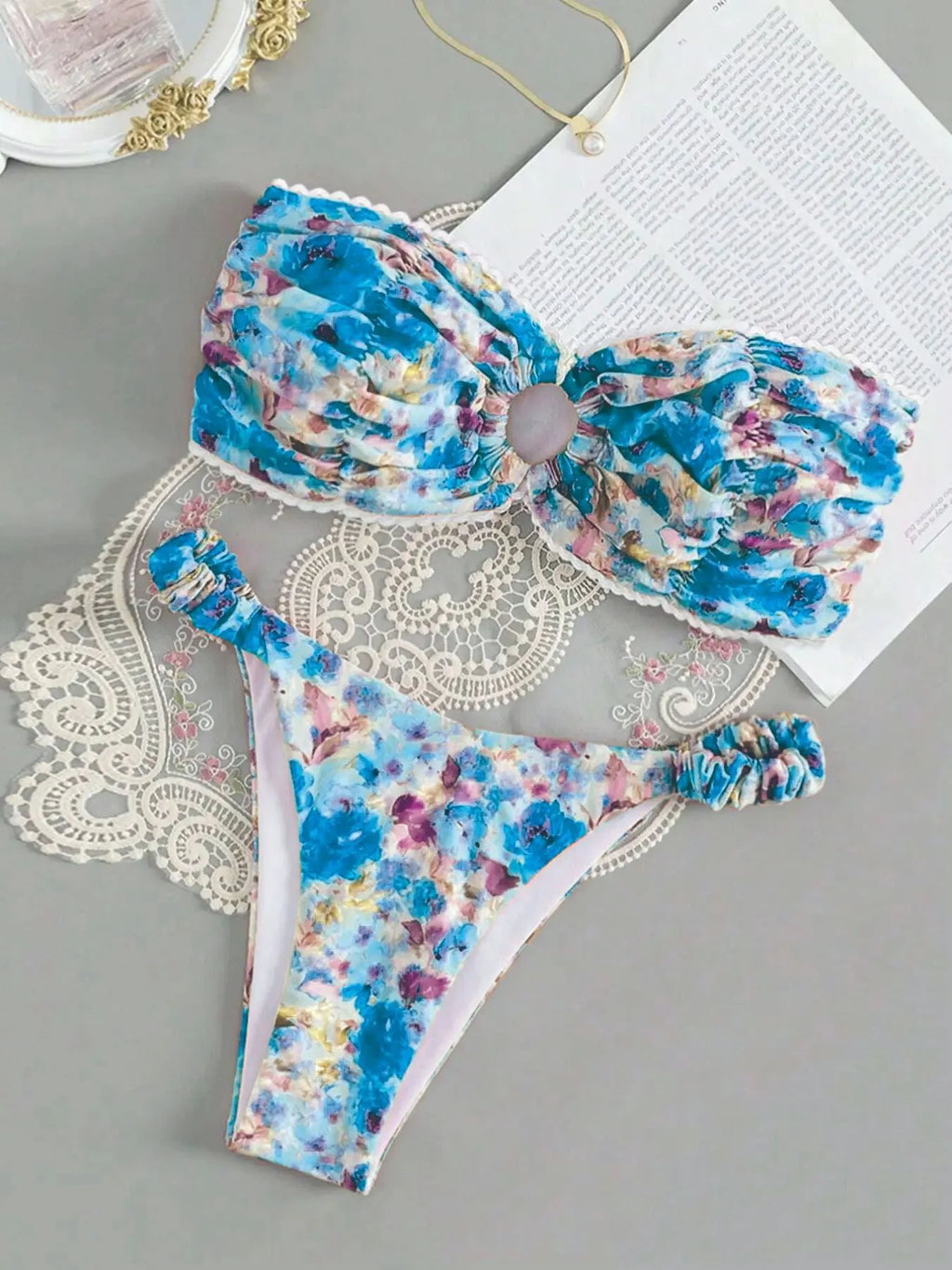 Women's floral printed bikini set with lace-up tube top and coordinating shorts for swimming