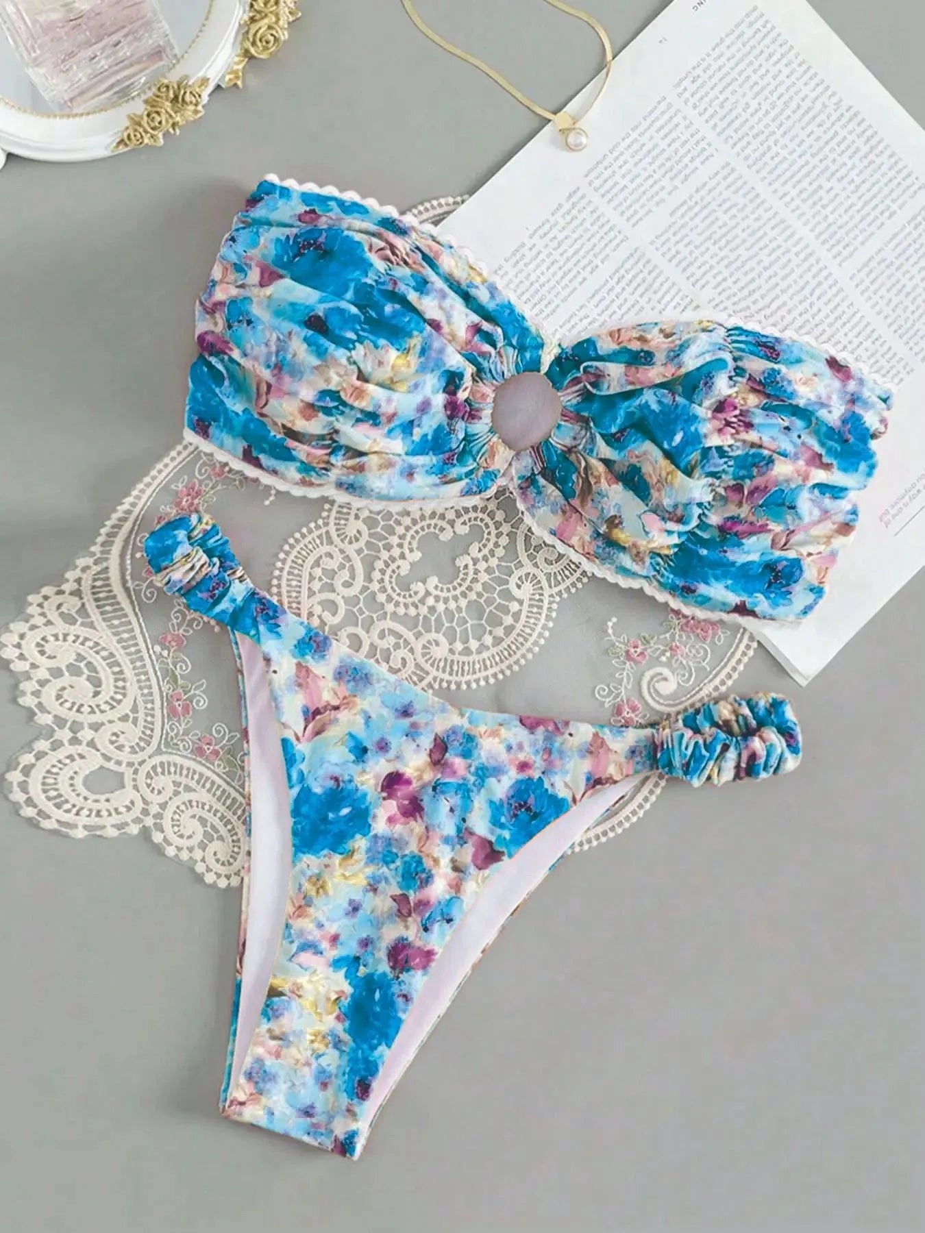 Women's floral printed bikini set with lace-up tube top and coordinating shorts for swimming