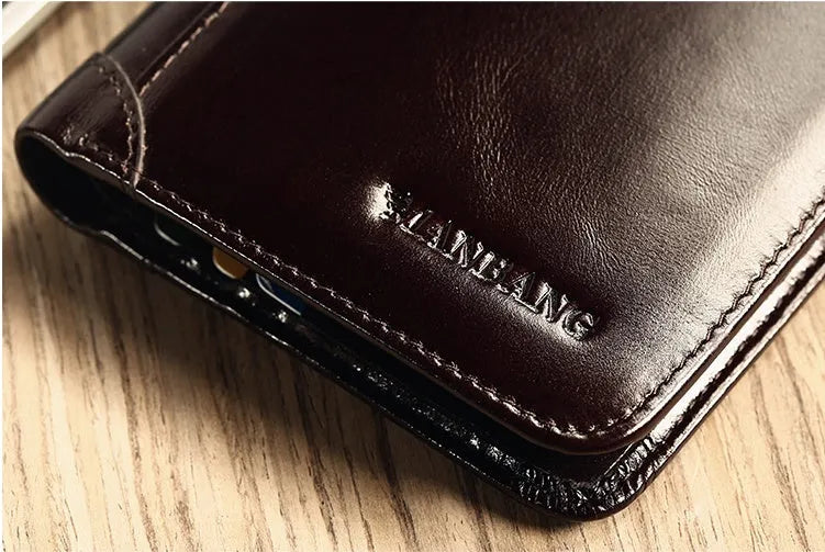Men's leather wallet showing internal organisation compartments for cards, cash and coins