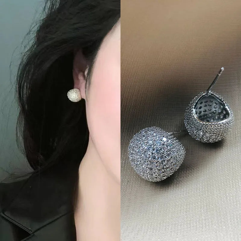 Geometric drop-shaped women's earrings with full diamond little golden beans construction in gold colour