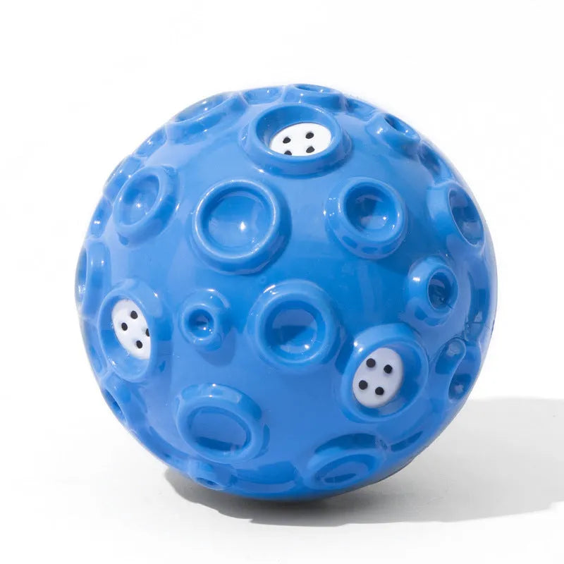 Durable natural rubber dog ball toy with textured surface and squeaker for aggressive chewers.