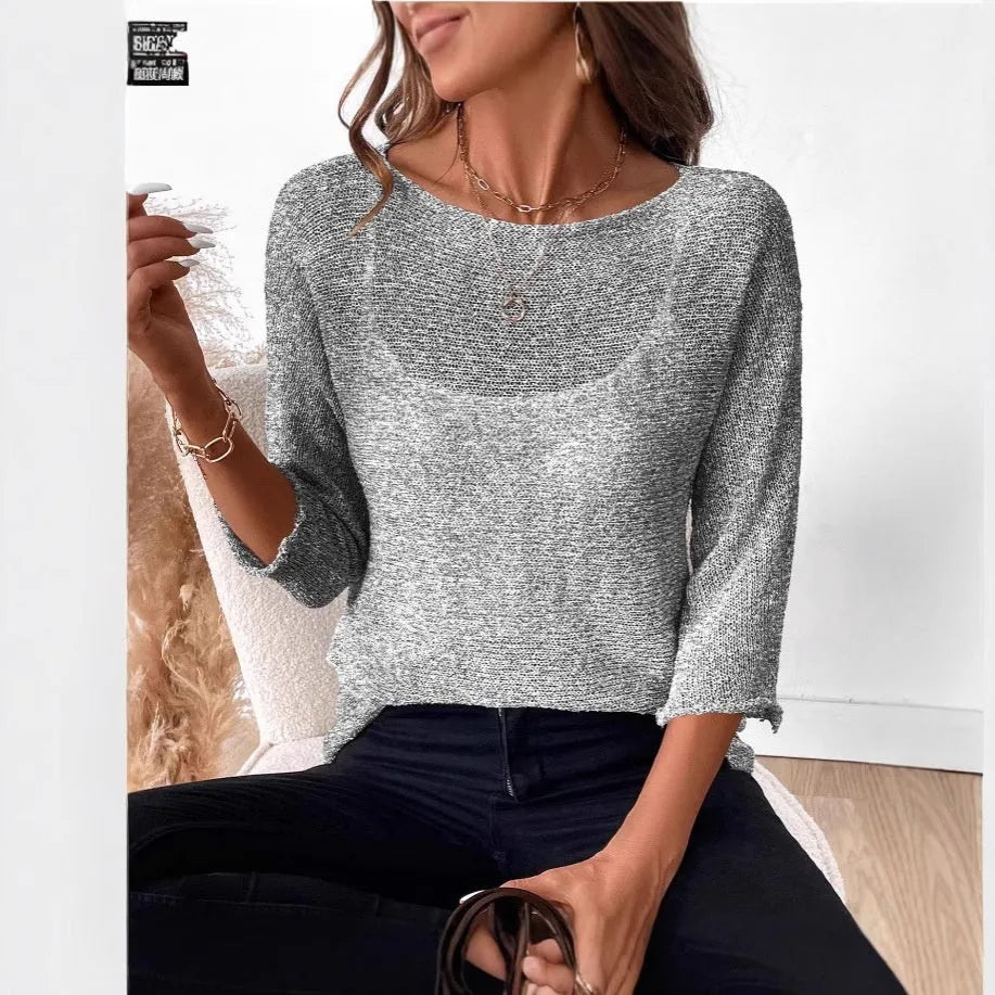 Women's off-shoulder knitted pullover top in lavender purple with a 3D pattern and 3/4 length sleeves.