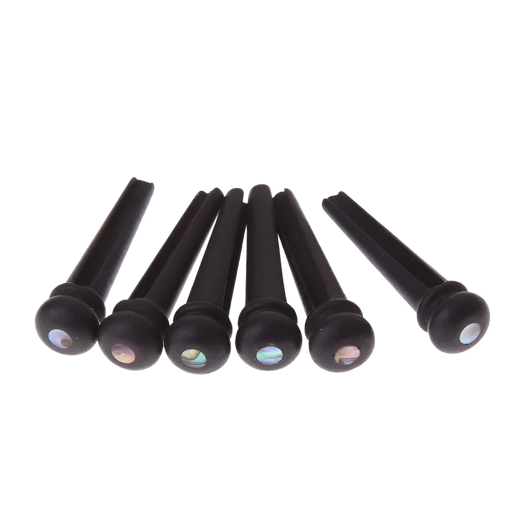 Six ebony guitar string nails with matt black finish for folk acoustic guitar bridge installation